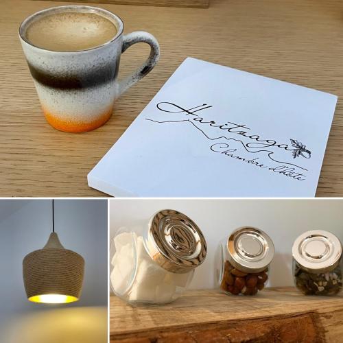 a cup of coffee and a piece of paper withigraphy at HARITZAGA chambre d'hôte terrasse & jardin privé in Biarritz