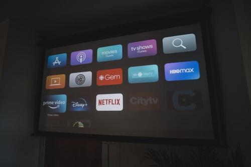 a television screen with different apps on it at The Kumu House in Kailua-Kona