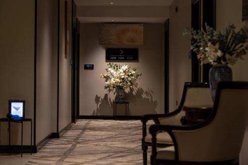 TV a/nebo společenská místnost v ubytování Skyline Hotel & Suites
