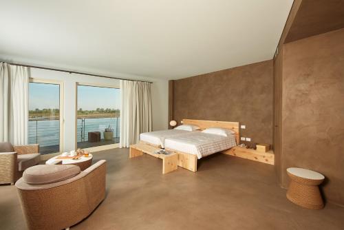 Кровать или кровати в номере Boutique Hotel Oche Selvatiche