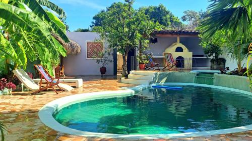 a pool in the backyard of a house at Hotel La Polvora in Granada