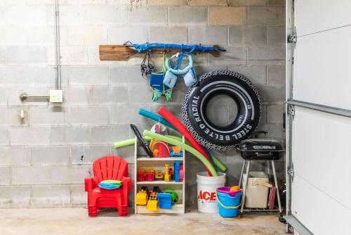 a room with a wall with a bunch of toys at Island Time -- Oceanfront Bliss in Saint Augustine