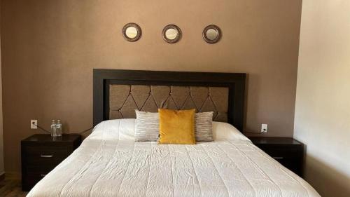 Cama o camas de una habitación en Cabañas Rancho San Jorge