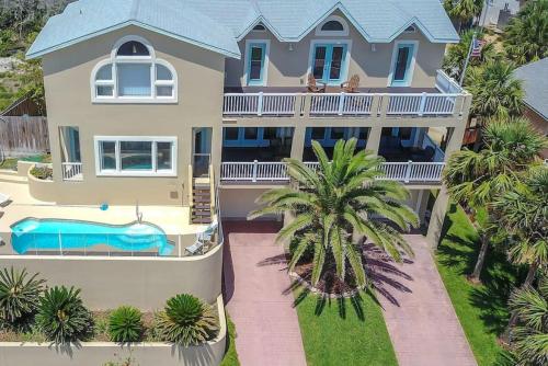 an aerial view of a house with a swimming pool at The Sand Castle Heated Pool Atlantic Ocean in St. Augustine