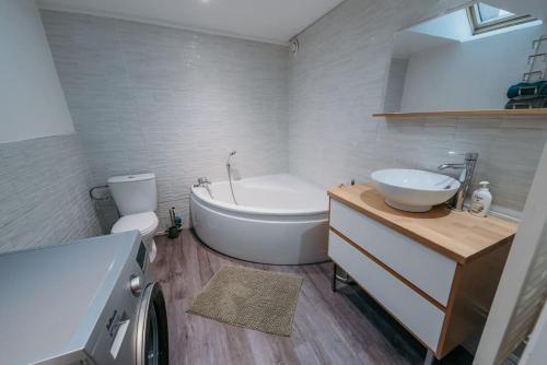 Ένα μπάνιο στο Appartement de Romain
