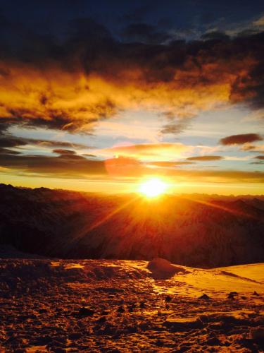 a sunset from the top of a mountain at Urbanhof in Sölden