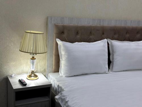 Katil atau katil-katil dalam bilik di SEMURG HOTEL
