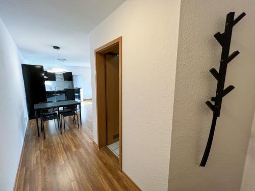 TV a/nebo společenská místnost v ubytování Casa Sali - stilvolle Ferienwohnung bei Heidelberg mit Terrasse & Parkplatz