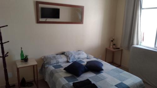 Katil atau katil-katil dalam bilik di Casa Privativa Iguaba Grande, a 450 metros da Praia