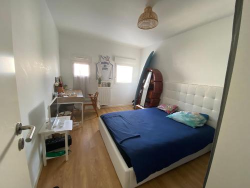 Ein Bett oder Betten in einem Zimmer der Unterkunft Bel appartement idealement situé