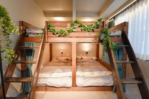 a couple of bunk beds in a room at Hotel Tokyo Hub - Vacation STAY 27587v in Tokyo