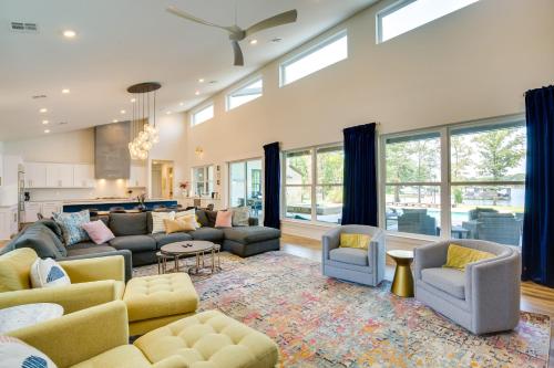 a large living room with couches and a kitchen at On Cedar Creek Reservoir Malakoff Home with Pool! in Malakoff