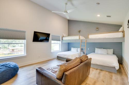 a bedroom with two bunk beds and a couch at Outdoor Oasis Family Malakoff Gem on Cedar Creek! in Malakoff
