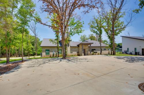 an empty driveway in front of a house at Outdoor Oasis Family Malakoff Gem on Cedar Creek! in Malakoff