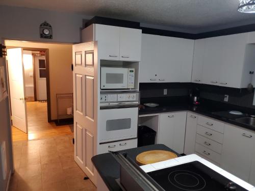 Una cocina o cocineta en Le1226 Apartment