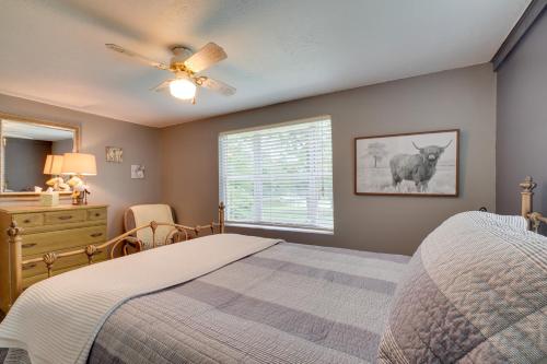 een slaapkamer met een bed en een raam bij Lakefront Spring City Retreat with Boat Dock! in Spring City