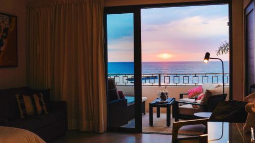 a hotel room with a view of the ocean at La Puesta Sayulita in Sayulita