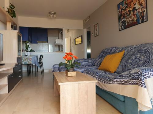 Un lugar para sentarse en Apartamento 2 habitaciones en Benalmádena