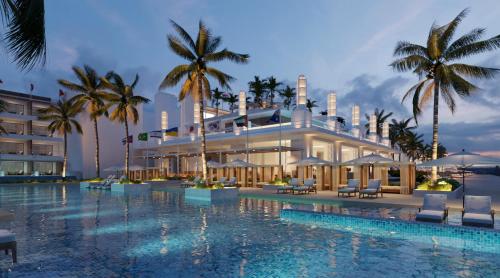 un hotel con piscina frente a un edificio en Princess Senses The Mangrove Resort - Adults Only, en Green Island