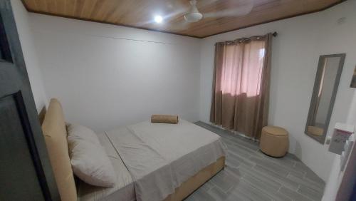 Ein Bett oder Betten in einem Zimmer der Unterkunft Casa Dñ Ana