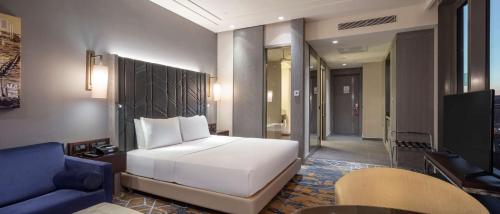 Ένα ή περισσότερα κρεβάτια σε δωμάτιο στο Hilton Istanbul Bakirkoy