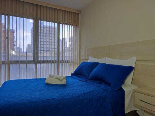 Postel nebo postele na pokoji v ubytování Apartamento Master no centro de Curitiba