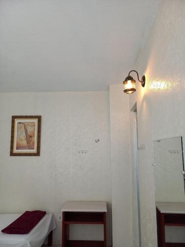 Postel nebo postele na pokoji v ubytování Hospedagem Serra da Lua