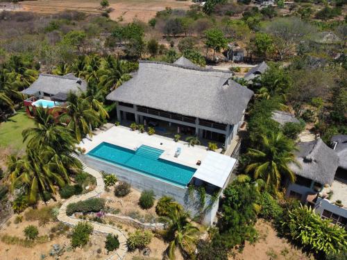 an aerial view of a house with a swimming pool at Casa Julia in Puerto Escondido