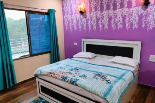 Voodi või voodid majutusasutuse GRG Mohit Paying Guest House Varanasi toas