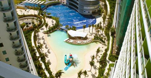 an aerial view of a pool in a resort at Velvet Waves in Manila