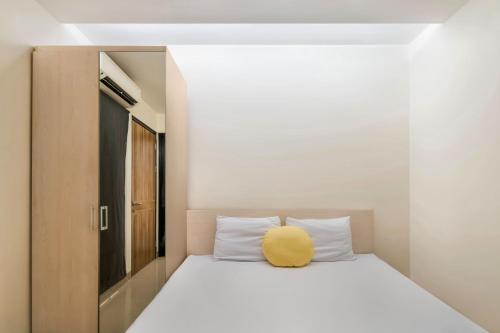 Tempat tidur dalam kamar di Cove Guntur Heritage