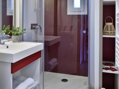 a bathroom with a sink and a shower at Chalet in Propriano near Sandy Beaches in Propriano