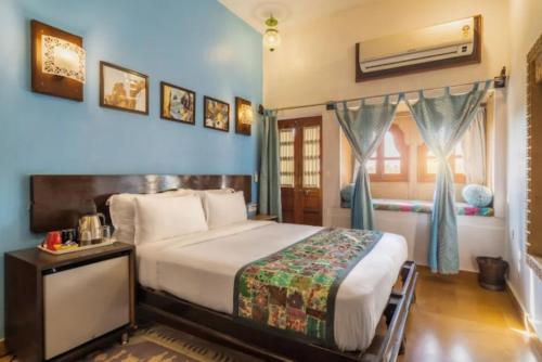 Voodi või voodid majutusasutuse Hotel The Grand Royal Jaisalmer toas
