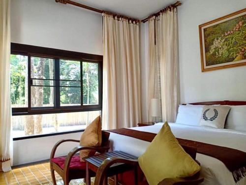 Postel nebo postele na pokoji v ubytování Pool Villa Phuchaofa@Phuket