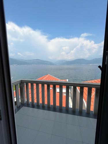 a view of the ocean from the balcony of a boat at Casa Brilla in Tivat