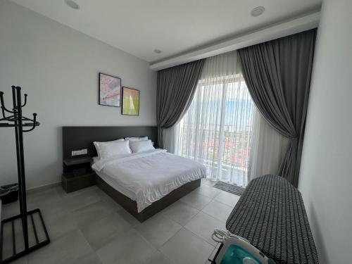 Sandakan SeaView-Suite Top Floor 객실 침대