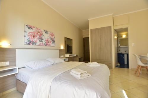 Katil atau katil-katil dalam bilik di Flisvos Rooms