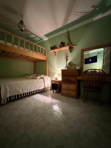 Postel nebo postele na pokoji v ubytování Casa Tecolote