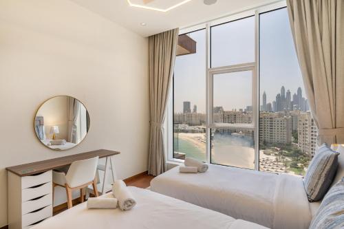 a hotel room with two beds and a large window at Tanzanite Residence Palm Jumeirah- 2BR & Maids Room - Allsopp&Alsopp in Dubai