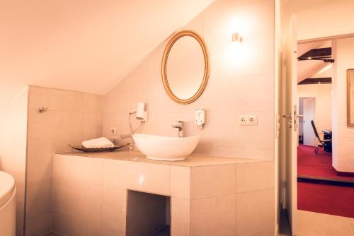 Ванная комната в Schlosshotel Neufahrn