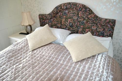 Кровать или кровати в номере Ely Guest House