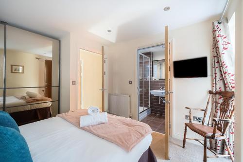 Ένα ή περισσότερα κρεβάτια σε δωμάτιο στο Hare Hideaway - Apartment 200m from York Minster