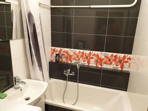 a bathroom with a shower and a sink at Fantastic - NS54 Room I in Warsaw