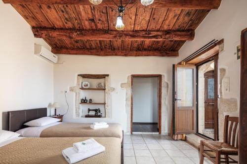 Ένα ή περισσότερα κρεβάτια σε δωμάτιο στο Villa Satra