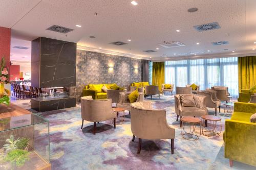ACHAT Hotel Frankfurt Maintalにあるシーティングエリア