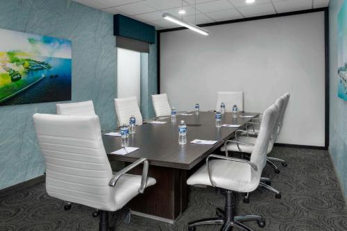 a conference room with a long table and chairs at Hampton Inn & Suites at Lake Mary Colonial Townpark in Lake Mary