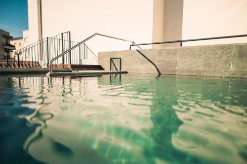 Kolam renang di atau dekat dengan Legado Magdalena Hotel