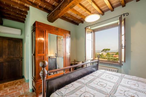 Postel nebo postele na pokoji v ubytování Il Querciolo - Azienda biologica, Agriturismo e Cantina