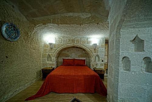 Cama o camas de una habitación en Holiday Cave Hotel