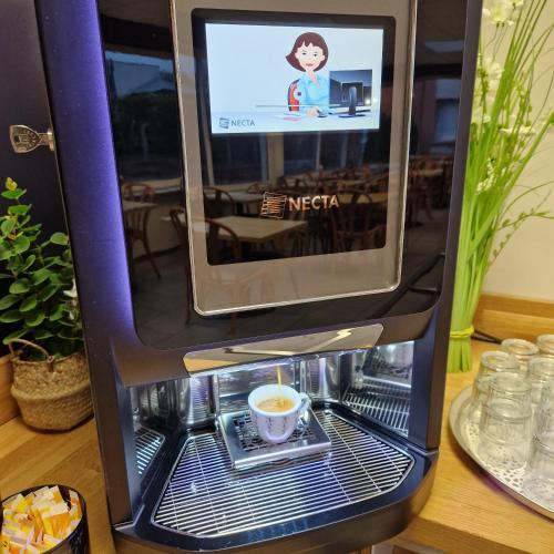 Kyriad Direct Limoges Nordにあるテレビまたはエンターテインメントセンター